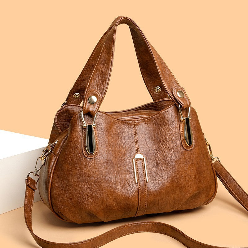 Solid-color multi-pocket handbag